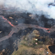Aerial view of the lower East Rift Zone showing the lava channel merging from Fissure 22 (not visible, but to the center, far right of the image).